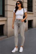 Blugi Skinny Fit gri cu tente de gălbui